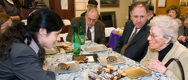 Ellen Goelz, Consul of the Federal Republic of Germany in New York, and Greg Schneider, Executive Vice President, Claims Conference, met with survivors in Brooklyn after Hurricane Sandy. 