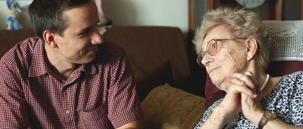 Agnes, a Holocaust survivor in Hungary with her social worker