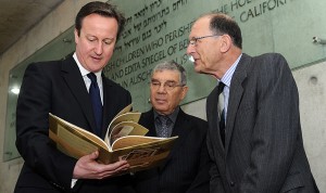 Henry Foner, right, was at Yad Vashem when Avner Shalev presented the book to PM Cameron as a memento of the role his country played in saving 10,000 Jewish children from the Nazis. The Claims Conference helped fund publication of an English/Hebrew version of the book.