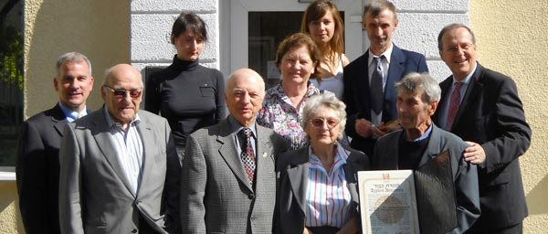 Sidney Zoltak and his family with one of the rescuers (bottom right) who helped hide him for 14 months.