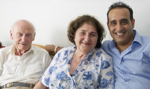 Eran-Shoham Simchi, right, of the Jewish Welfare Organization in Zurich visits with survivors Katharina and Erwin Hardy. Katharina receives an Article 2 pension as well as homecare and dental care. On the day of the visit, her husband Erwin received news that he was approved for an Article 2 pension as well. 