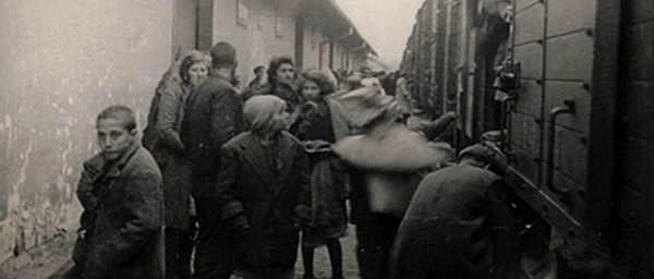 Skopje, Yugoslavia, Jews about to board a deportation train next to the Monopol tobacco depot, March 1943. Photo: Yad Vashem