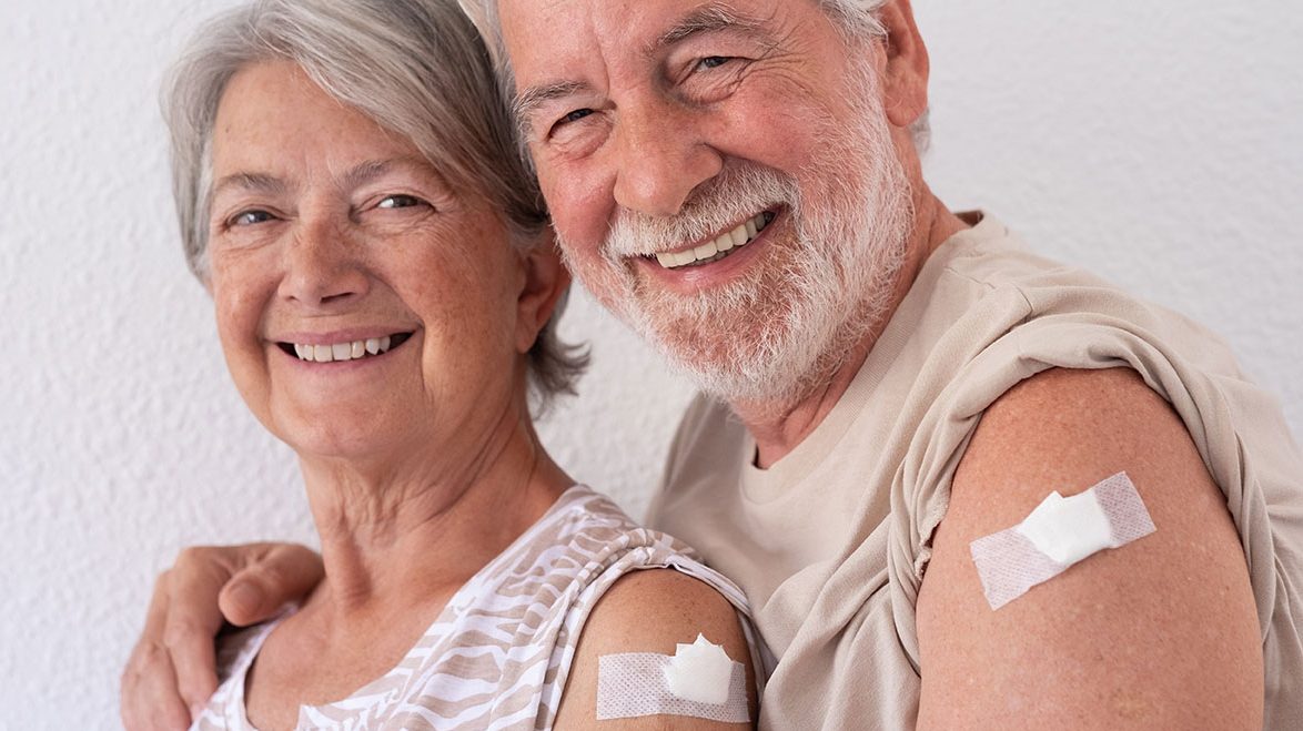 A couple has who has received their COVID-19 vaccine shot